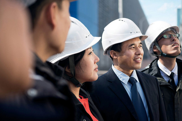 Danfoss employees working on the engineering project