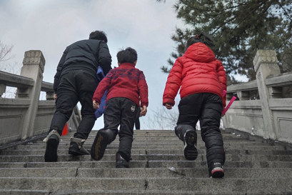 People walking up stairs in Benxi