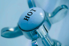 Cost considerations on storage tank versus heat exchanger for hot water preparation