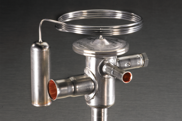 Brochure cover of a silver Danfoss thermostatic expansion valve