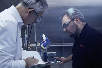 Engineers working on a new solution